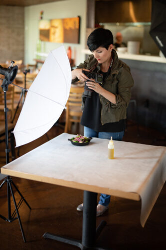 food photographer capturing food in a restaurant