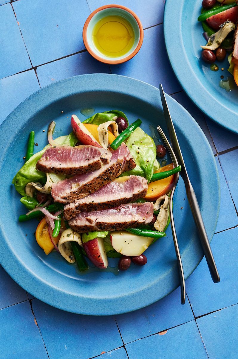 Seared tuna salad on blue tile