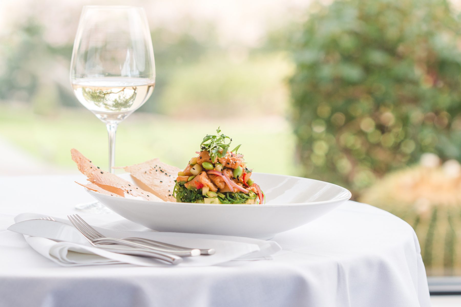 Plated dish with wine in golden resort light
